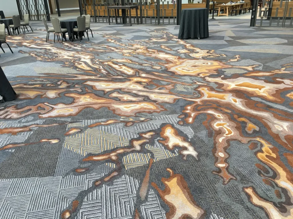 Commercial carpet installation with complex patterns, measured using Precision 3D LiDAR scanning for exact fit and efficient replacement.